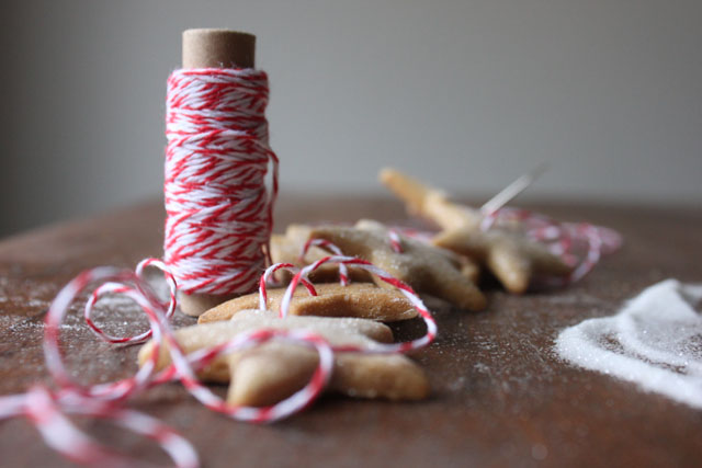 sewing gingerbread stars with bakers twine