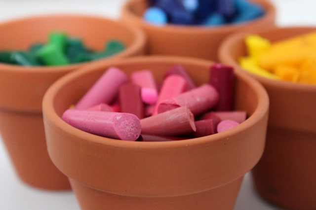 broken pinks old crayons in clay flower pots