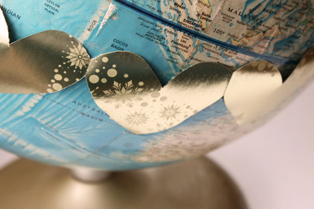 gold hearts globe up close