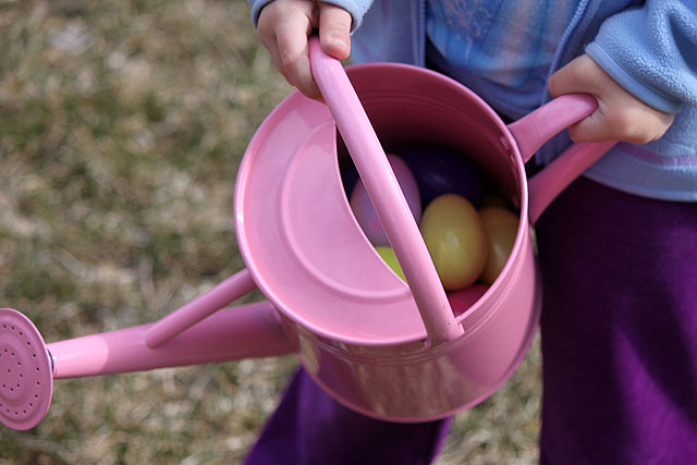 watering pail with plastic eggs