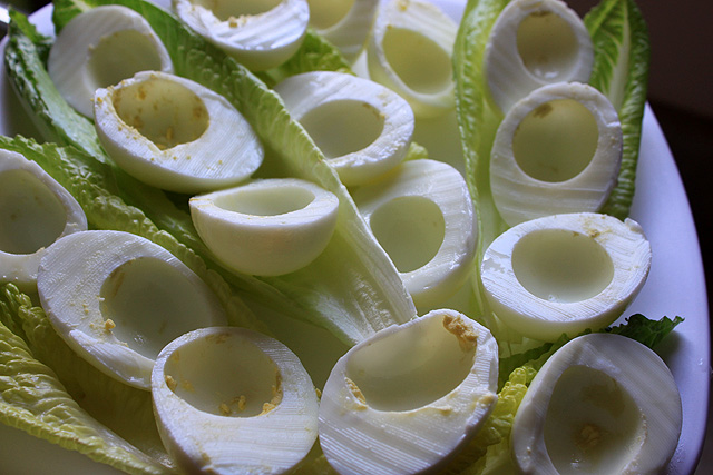 boiled yolks ready for filling on romaine