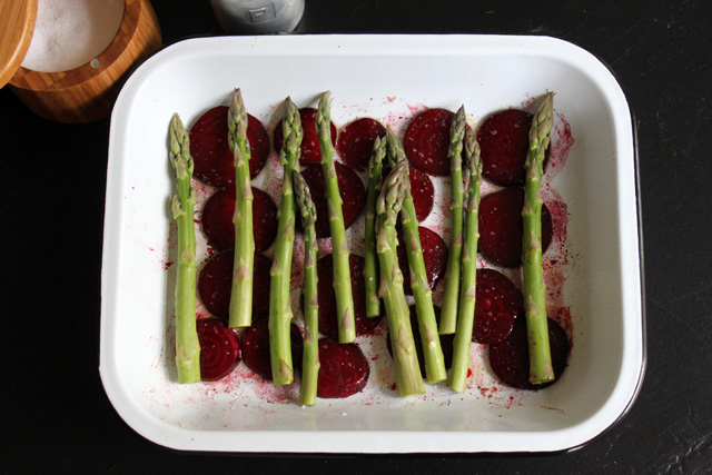 5 asparagus on top of roasted beets salt and pepper